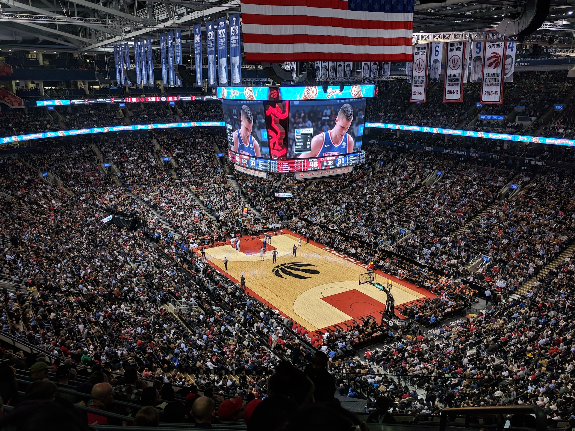 NBA team, The Toronto Raptors, are seen playing to a crowded Scotiabank Arena in Toronto, Ontario. Toronto Raptors' NBA Season Preview: Can They Soar in 2024?